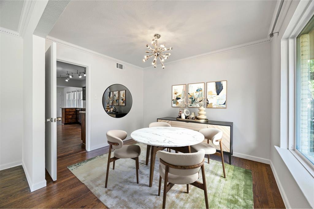 1630 Loree Drive Dallas, TX 75228 - Photo 5 of 20 a view of a dining room with furniture window and wooden floor
