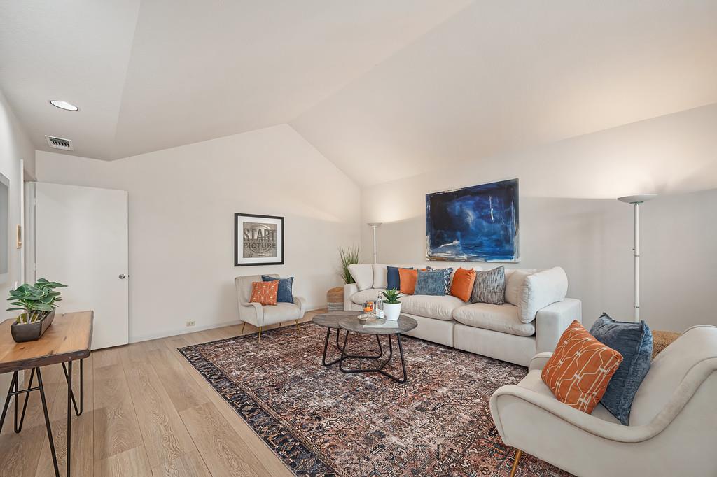 7650 Pineridge Road Fair Oaks, CA 95628 - Photo 46 of 67 a living room with furniture and wooden floor