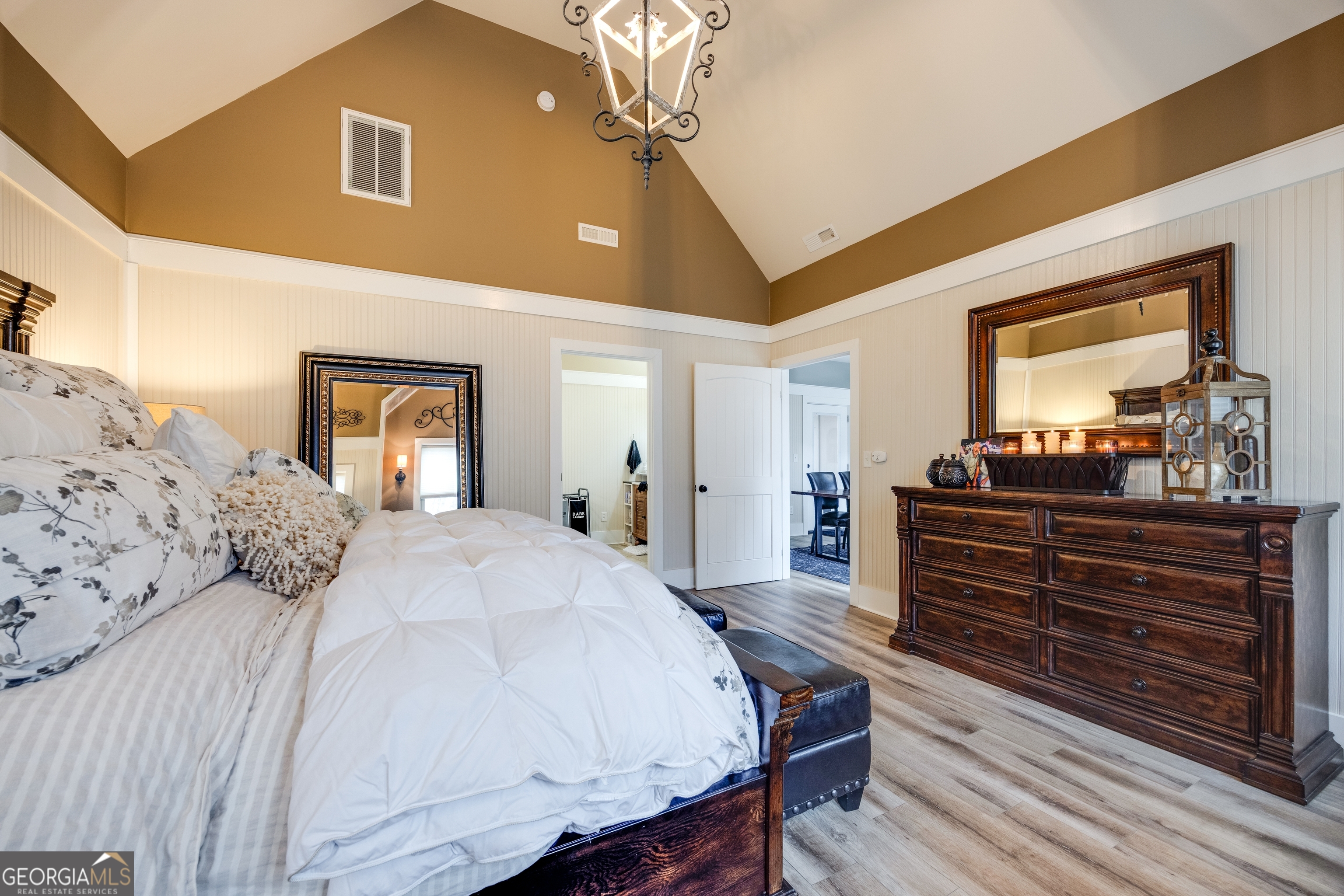 65 Eagle Bluff Road Menlo, GA 30731 - Photo 13 of 42 a spacious bedroom with a bed and a dresser