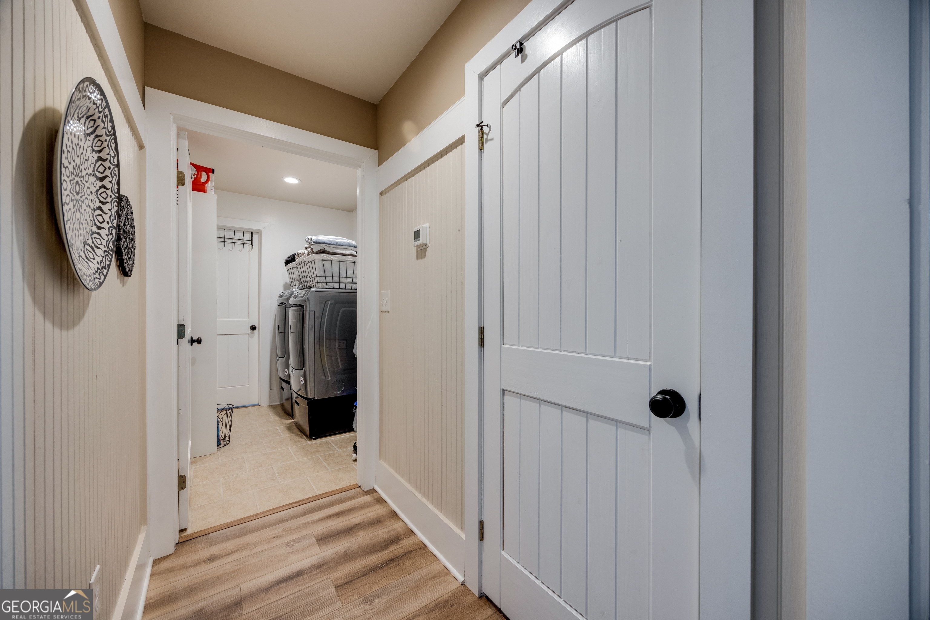 65 Eagle Bluff Road Menlo, GA 30731 - Photo 19 of 42 a walk in closet with wooden floor