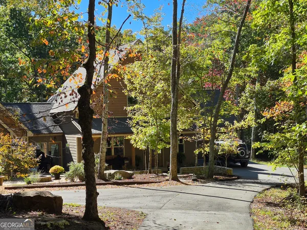 a view of a field with an outdoor space