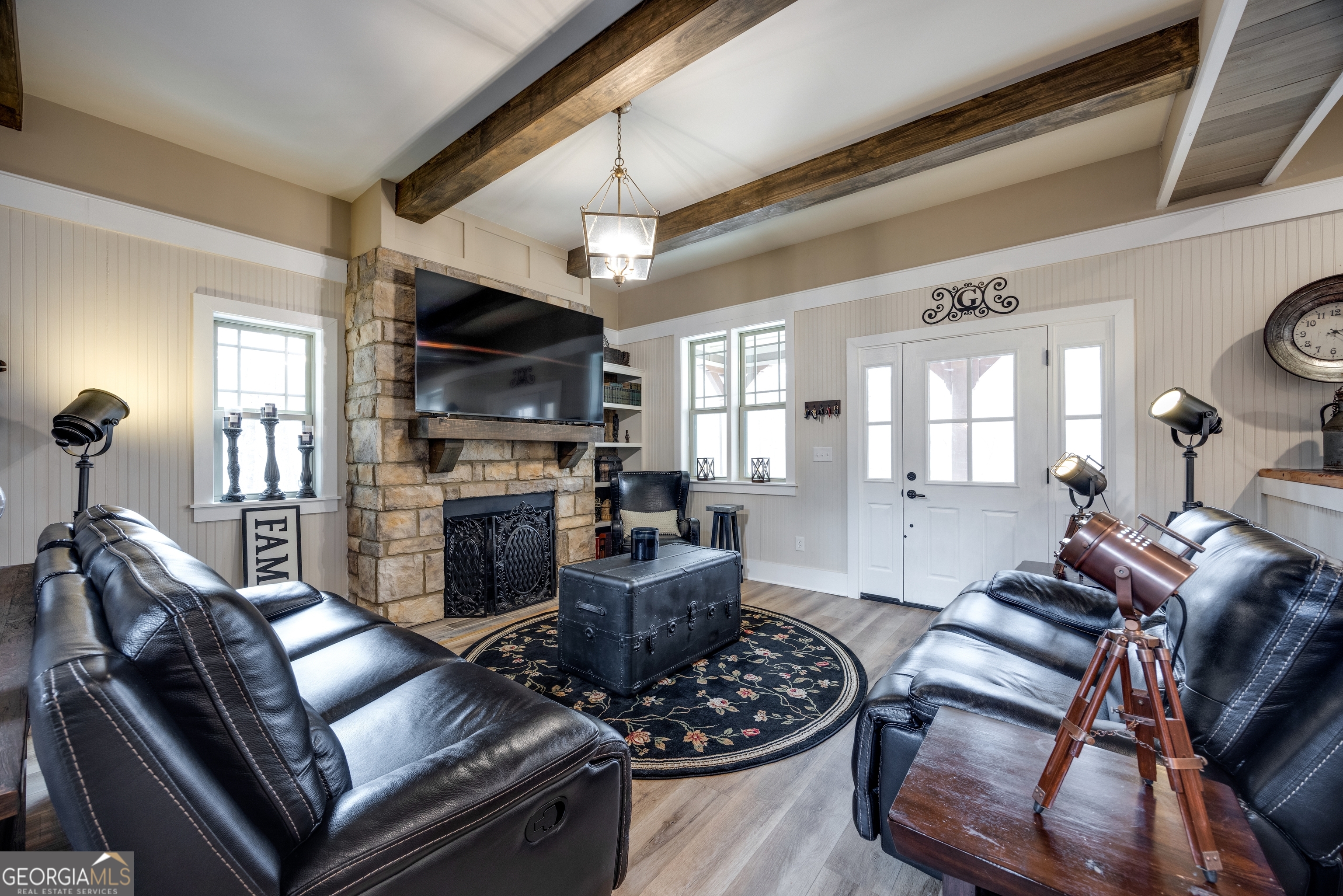 65 Eagle Bluff Road Menlo, GA 30731 - Photo 4 of 42 a living room with furniture fireplace and a flat screen tv