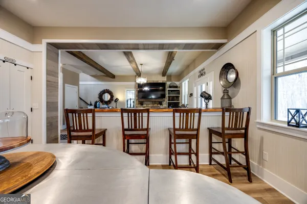 a view of a livingroom with furniture and windows