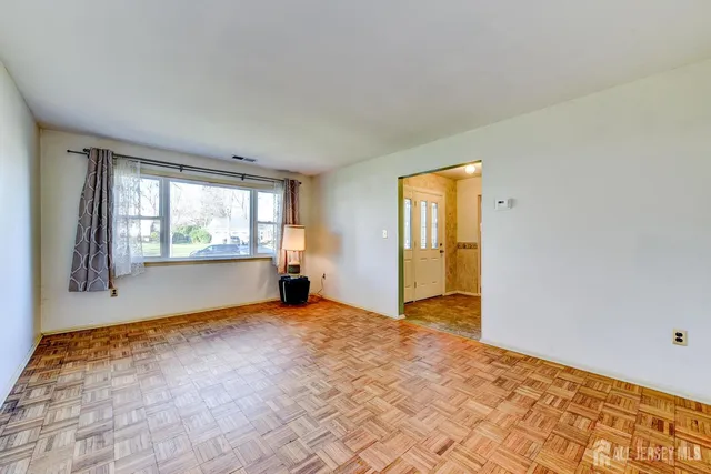 a view of an empty room with window