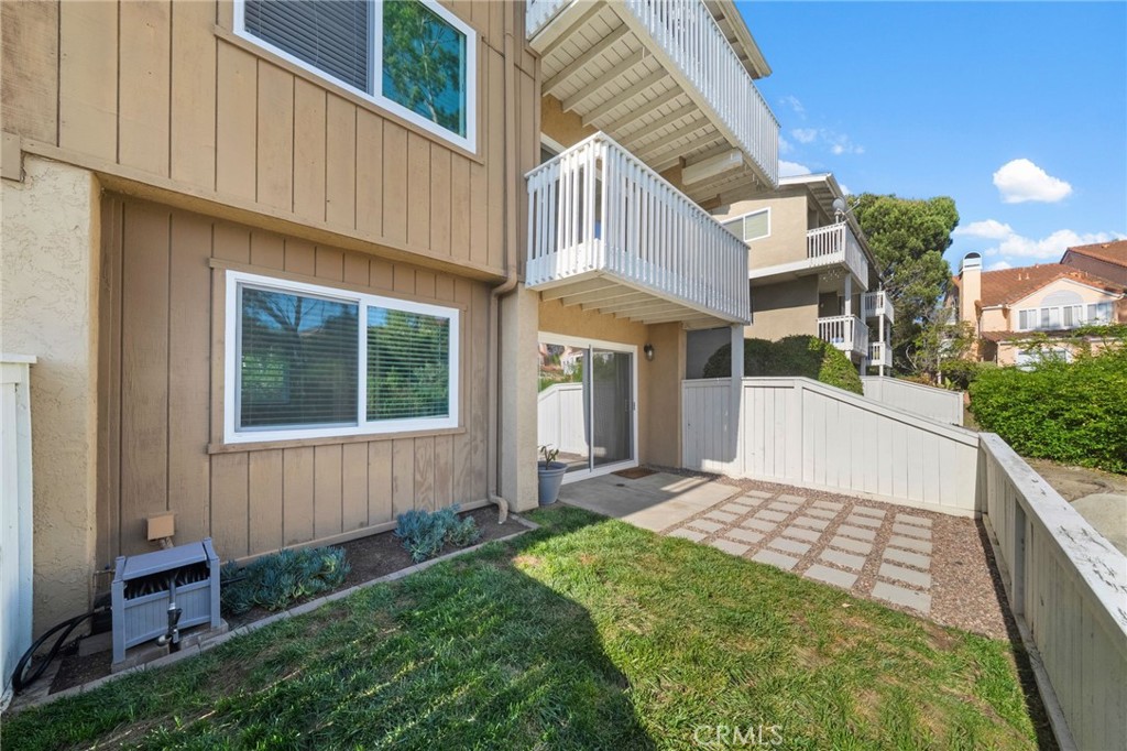 4219 La Pinata Way, Unit 252 Oceanside, CA 92057 - Photo 17 of 37 Spacious yard located off of the primary bedroom.
