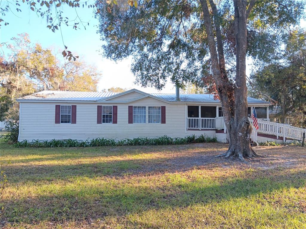 8009 Shoupe Road Plant City, FL 33565 - Photo 1 of 1 Beautiful triple wide on 2.38 acres