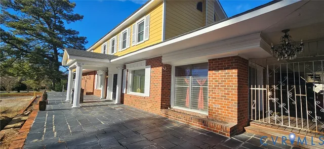 a front view of a house with a porch