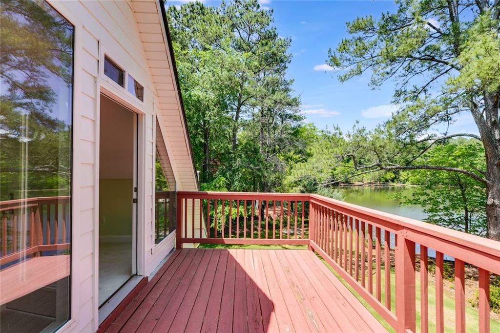 110 Pond View Point LaGrange, GA 30240 - Photo 40 of 68 a view of a balcony with wooden floor