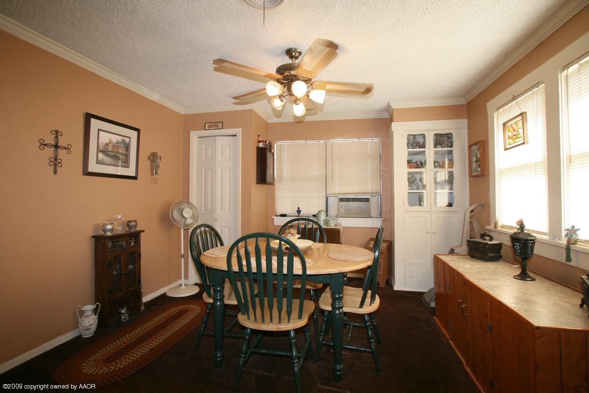 3700 South Harrison Street Amarillo, TX 79110 - Photo 10 of 14 a view of a dining room with furniture window and outside view