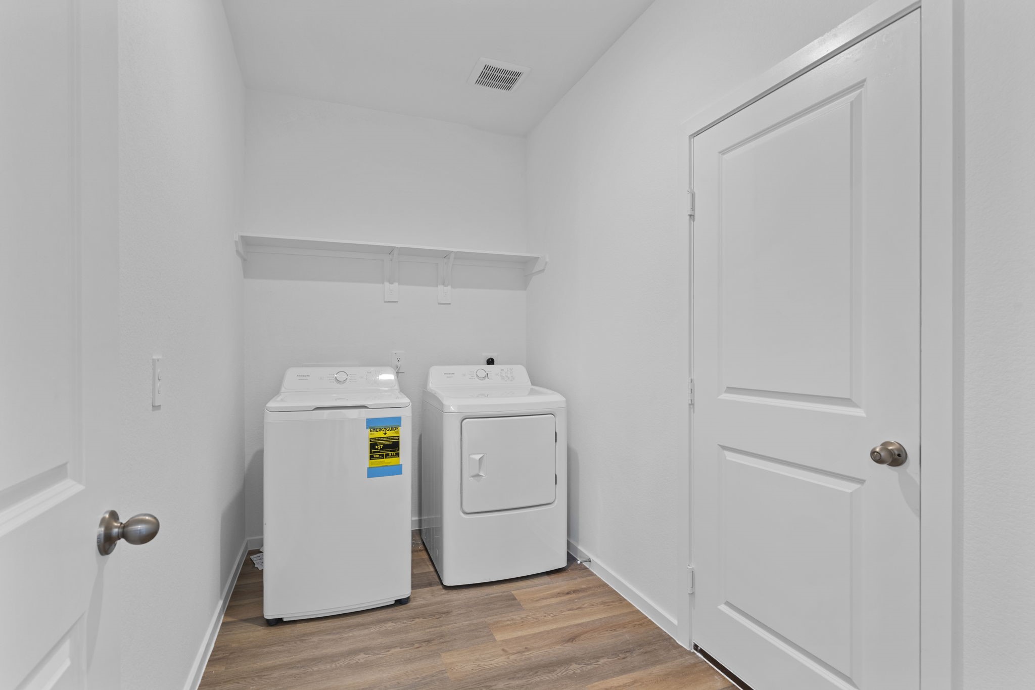 9019 Rose Water Iowa Colony, TX 77583 - Photo 11 of 44 a utility room with dryer and washer