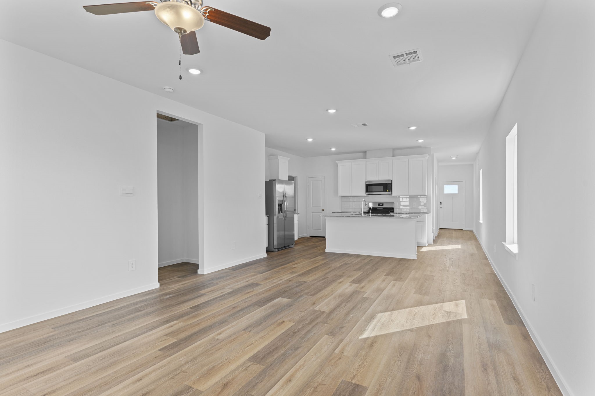 9019 Rose Water Iowa Colony, TX 77583 - Photo 23 of 44 a view of kitchen with refrigerator and window