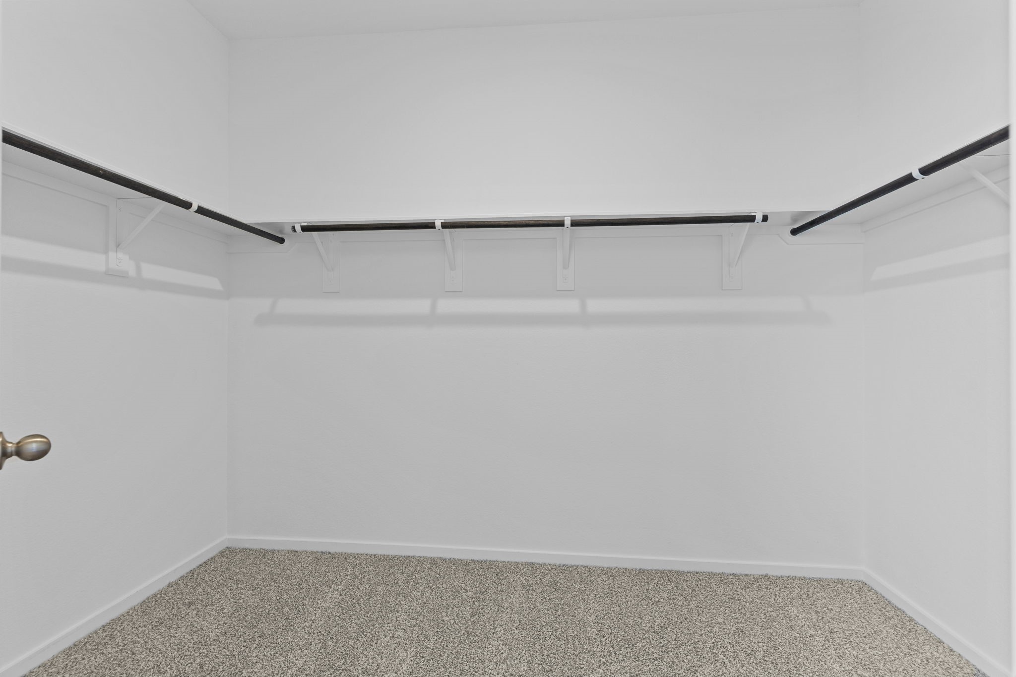 9019 Rose Water Iowa Colony, TX 77583 - Photo 35 of 44 a view of small space with racks on the wall