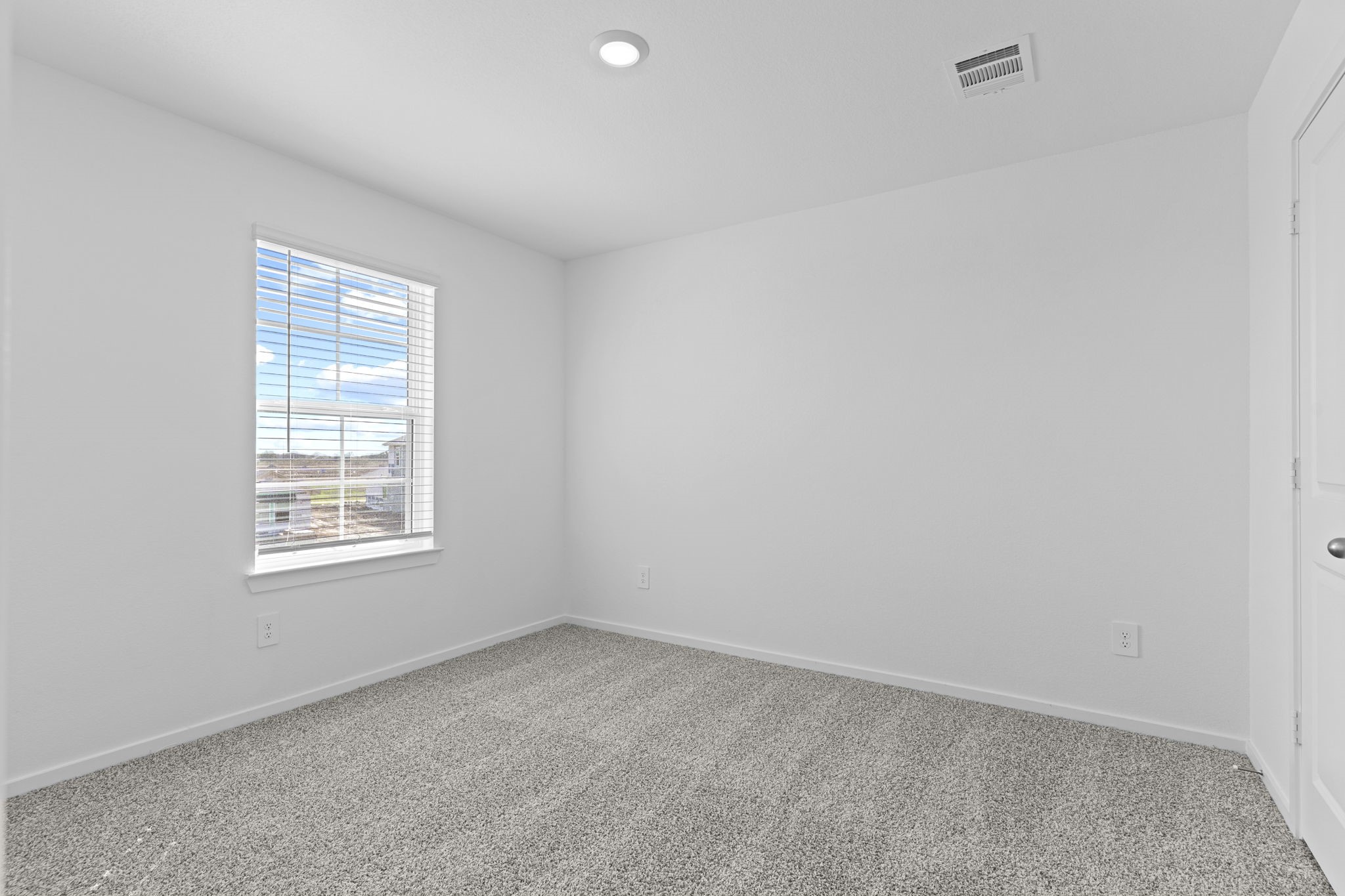 9019 Rose Water Iowa Colony, TX 77583 - Photo 37 of 44 an empty room with a window