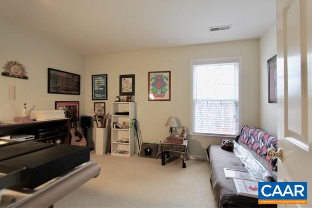 82 Northridge Road Ruckersville, VA 22968 - Photo 16 of 23 a living room with furniture and a flat screen tv