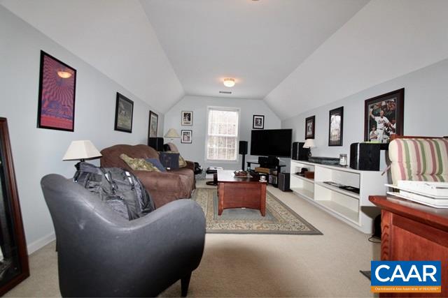 82 Northridge Road Ruckersville, VA 22968 - Photo 17 of 23 a living room with furniture and a flat screen tv