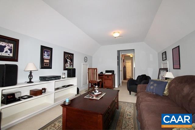 82 Northridge Road Ruckersville, VA 22968 - Photo 18 of 23 a living room with furniture and a flat screen tv