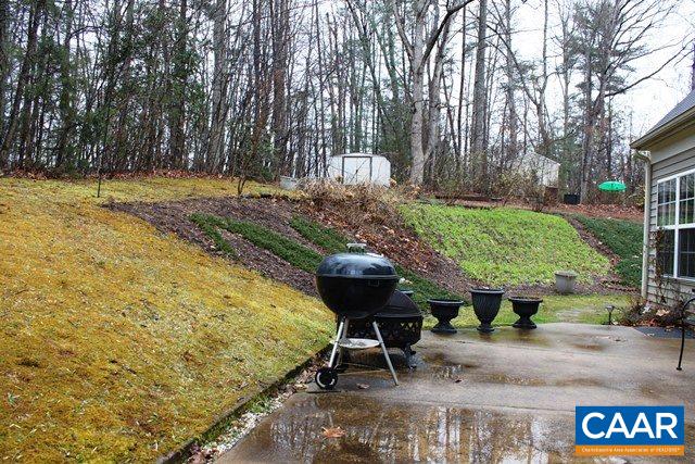 82 Northridge Road Ruckersville, VA 22968 - Photo 22 of 23 a view of a backyard with furniture
