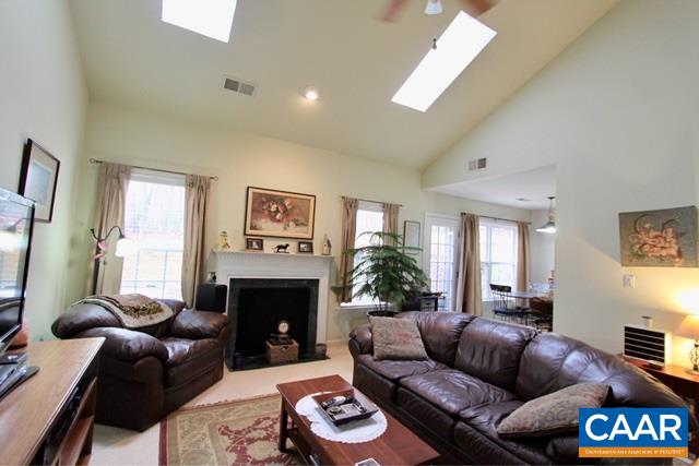 82 Northridge Road Ruckersville, VA 22968 - Photo 5 of 23 a living room with furniture and a fireplace