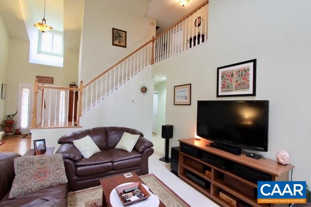 82 Northridge Road Ruckersville, VA 22968 - Photo 6 of 23 a living room with furniture and a flat screen tv