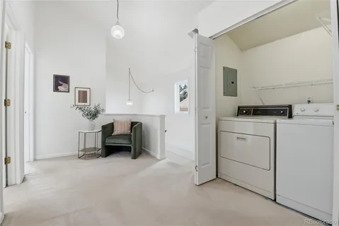 a view of an empty room with stairs