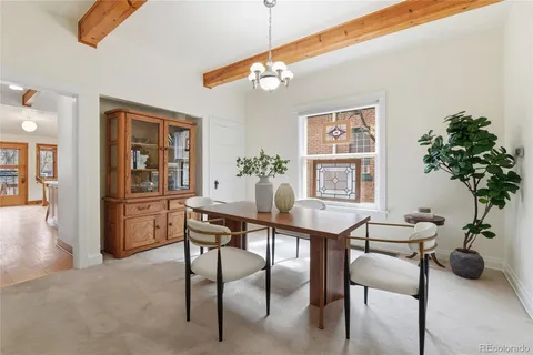 a view of a livingroom with furniture and window