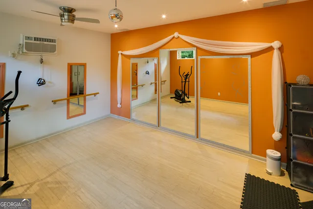 a view of swimming pool with a yard and plants