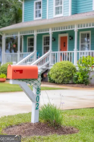 a bathroom with a toilet and a sink