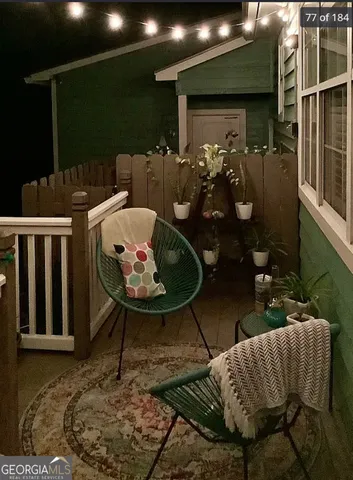 a bedroom with a bed a ceiling fan and a dresser