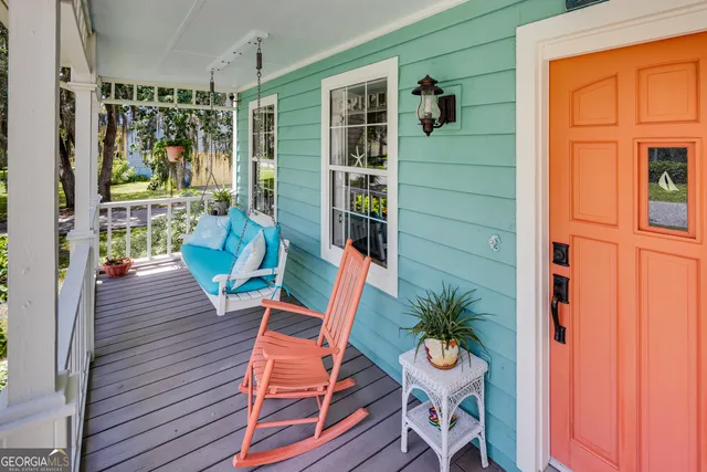 a bathroom with a shower and a sink