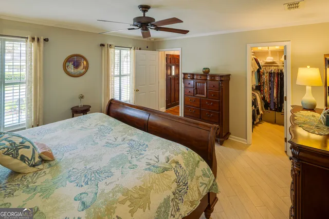 a front view of a house with a yard table and chairs
