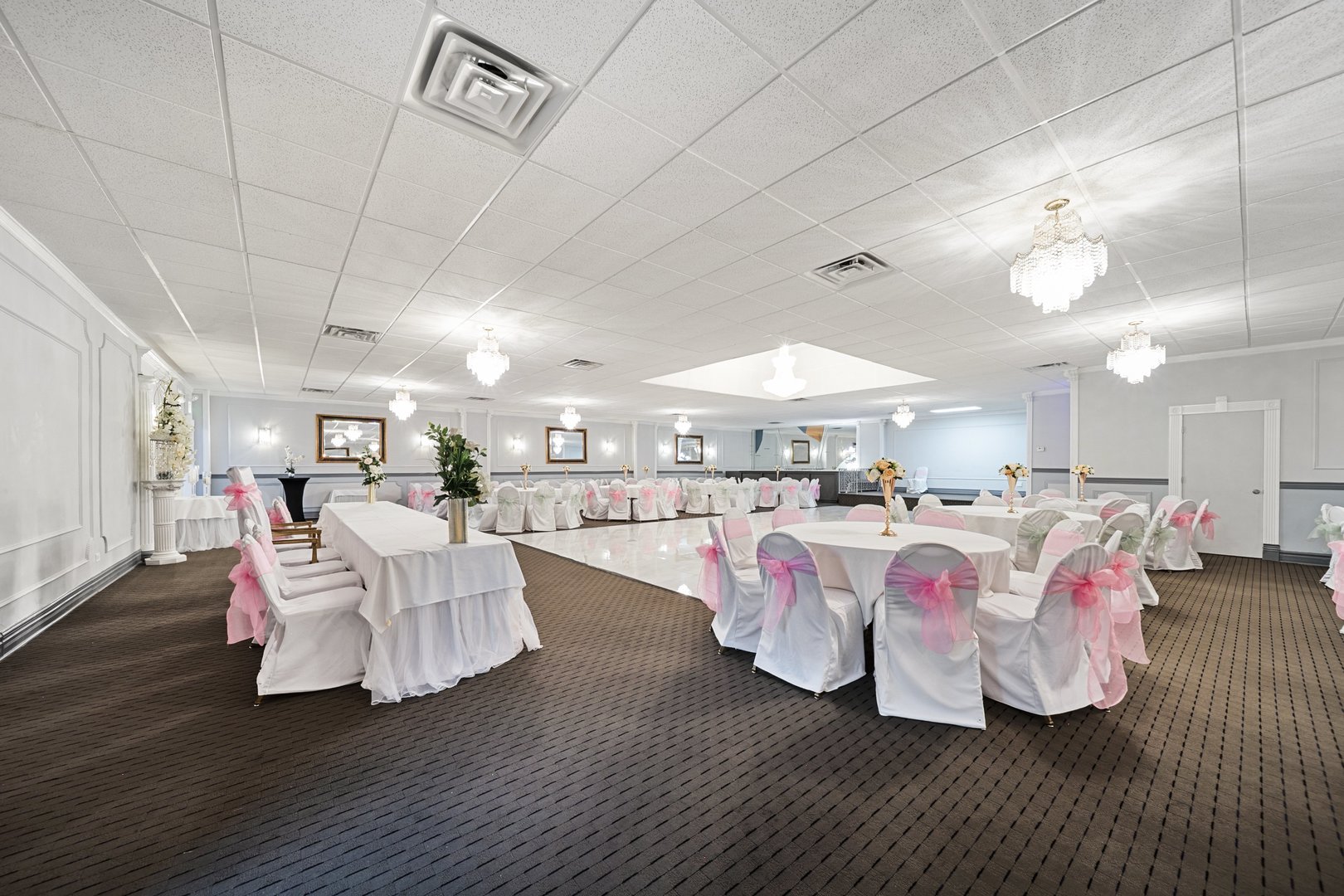 6155 West Fullerton Avenue Chicago, IL 60639 - Photo 12 of 43 a living room with furniture and a chandelier