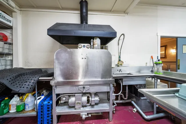 a room with furniture and a wooden floor