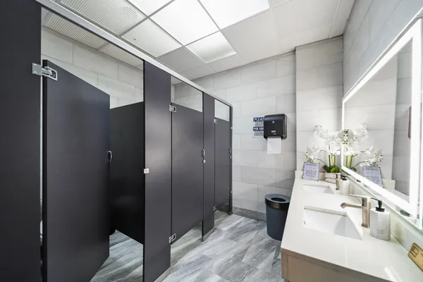 a bathroom with a sink and shower