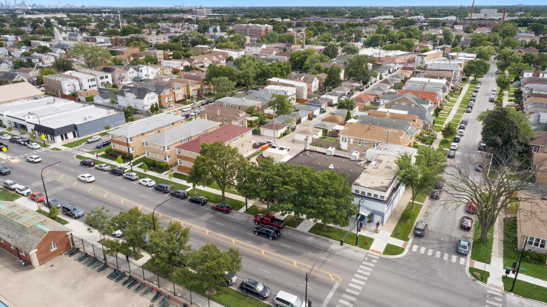 6155 West Fullerton Avenue Chicago, IL 60639 - Photo 26 of 43 an aerial view of residential houses with outdoor space