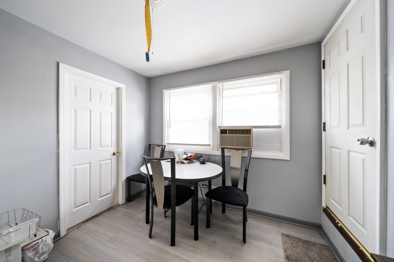 6155 West Fullerton Avenue Chicago, IL 60639 - Photo 30 of 43 a dining room with furniture and window