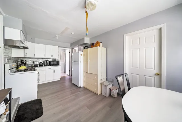 a view of a balcony with chairs