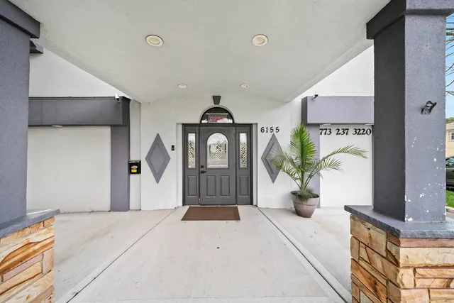 a front view of a house with entryway