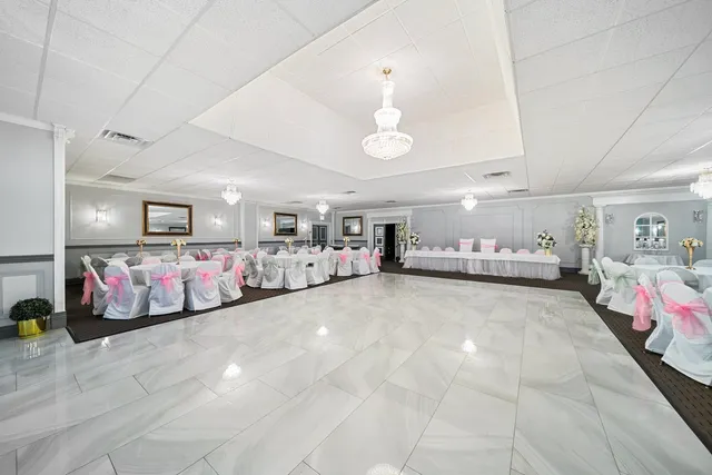 a big room with toys and flat screen tv