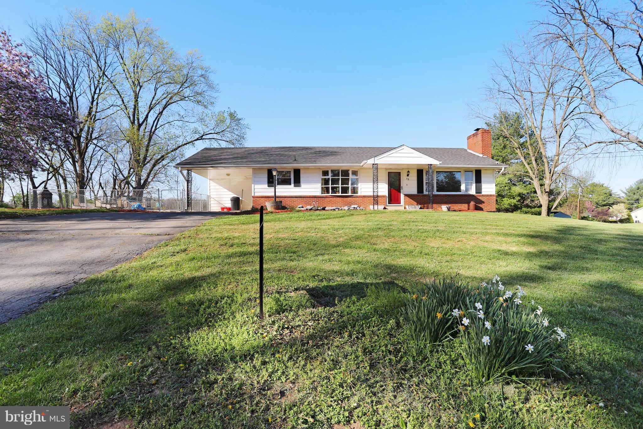 48 Thomas Jefferson Circle Ranson, WV 25438 - Photo 1 of 30 a front view of house with yard and green space