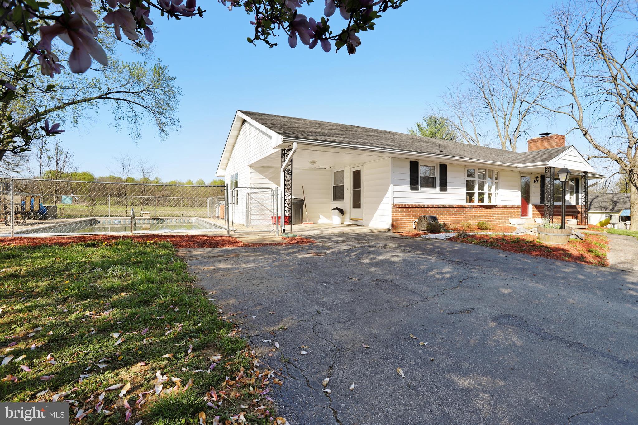 48 Thomas Jefferson Circle Ranson, WV 25438 - Photo 2 of 30 a front view of a house with a yard