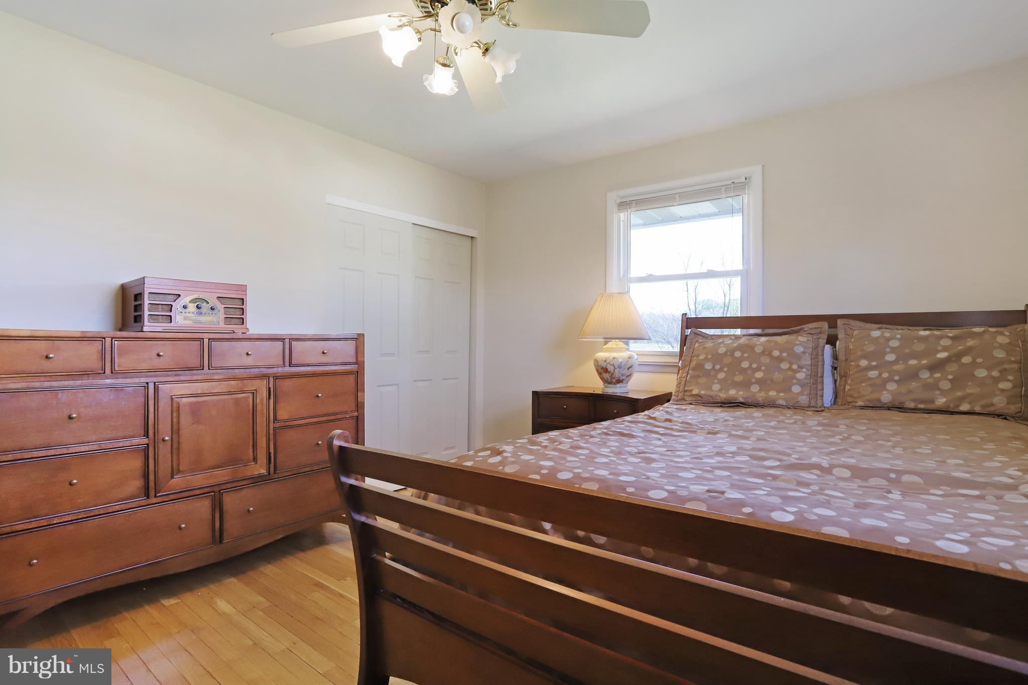 48 Thomas Jefferson Circle Ranson, WV 25438 - Photo 23 of 30 a bedroom with a bed and window