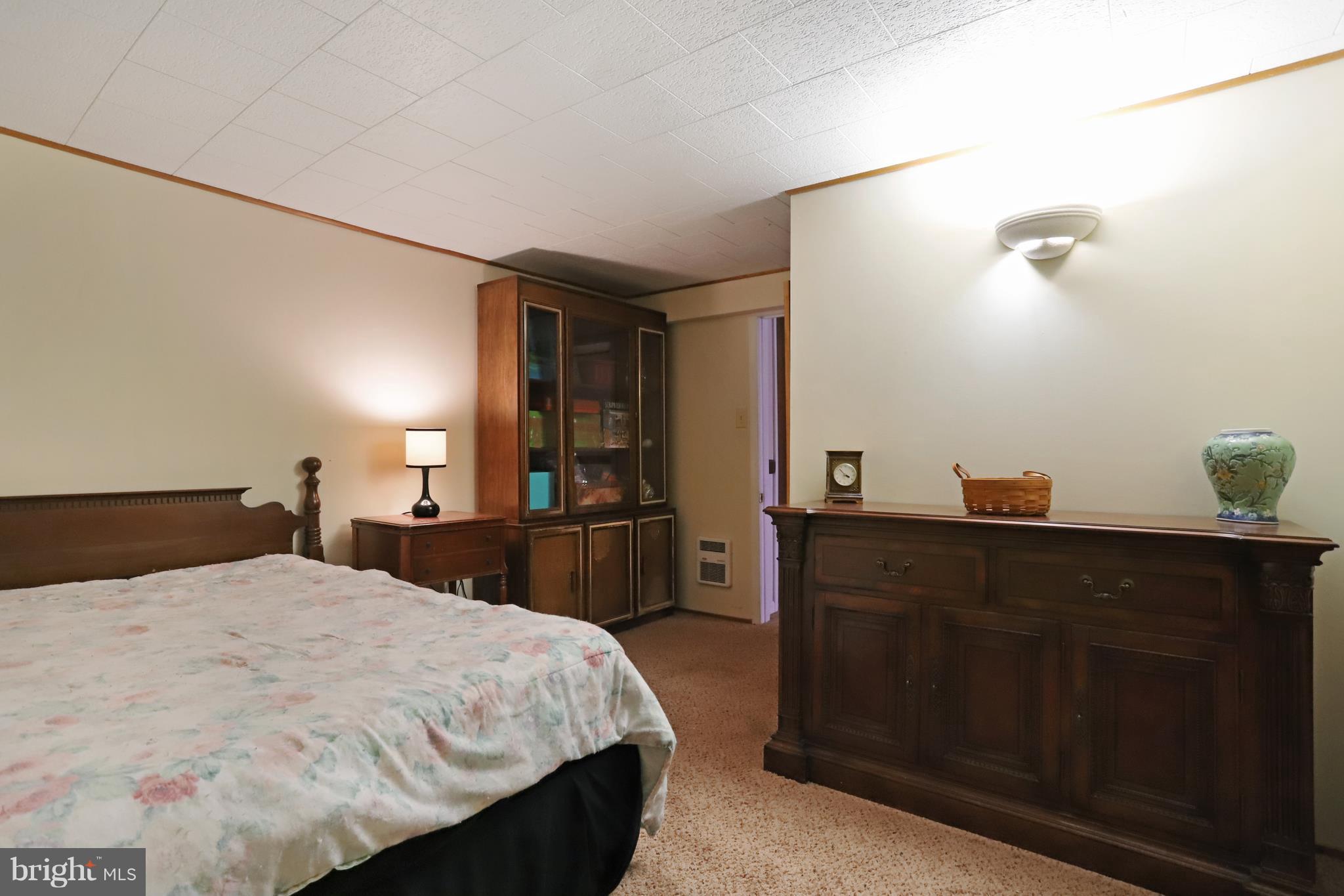 48 Thomas Jefferson Circle Ranson, WV 25438 - Photo 28 of 30 a bed room with a bed and a dresser
