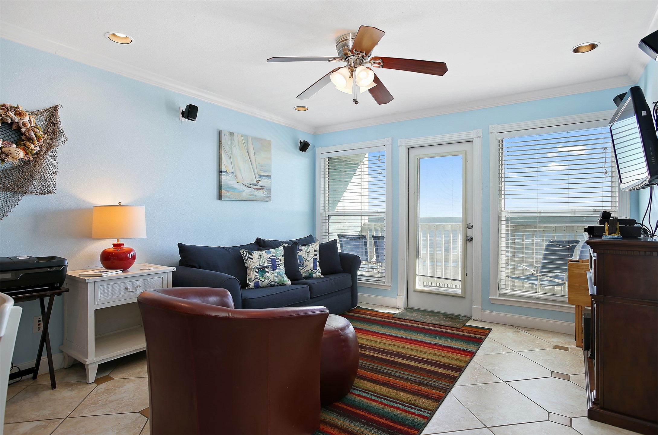 10811 Termini-San Luis Pass Road, Unit 2112 Galveston, TX 77554 - Photo 7 of 22 a living room with furniture and a window