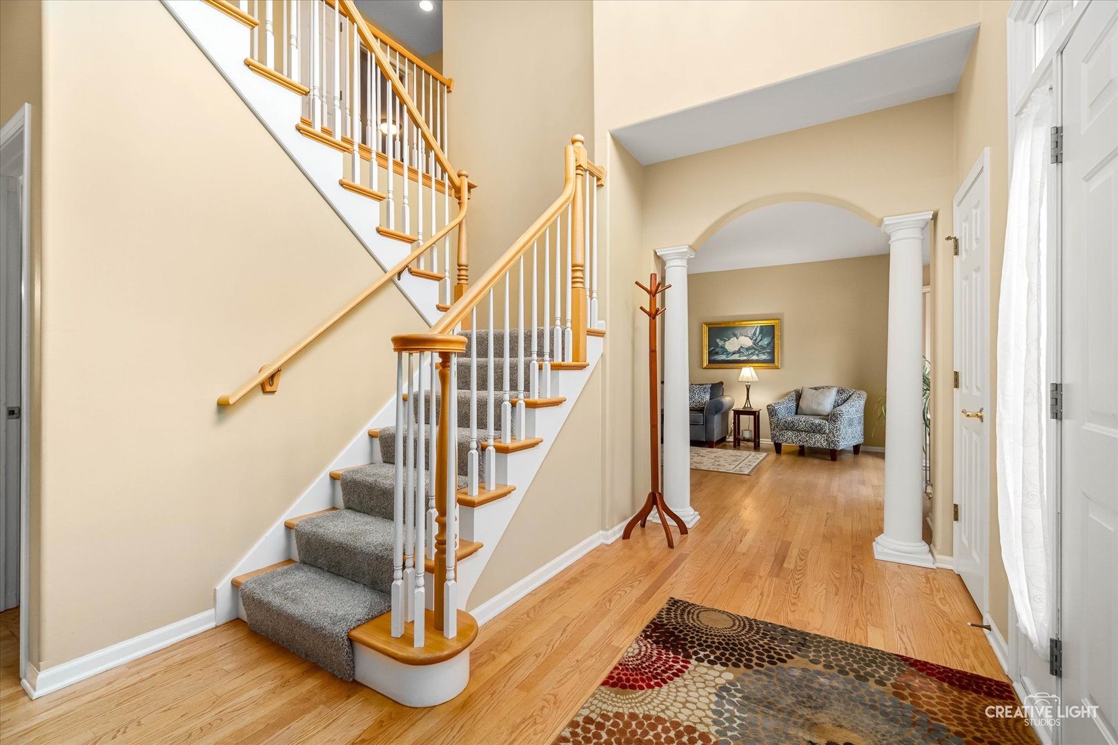 2543 Dewes Lane Naperville, IL 60564 - Photo 3 of 47 a view of entryway and hall with wooden floor
