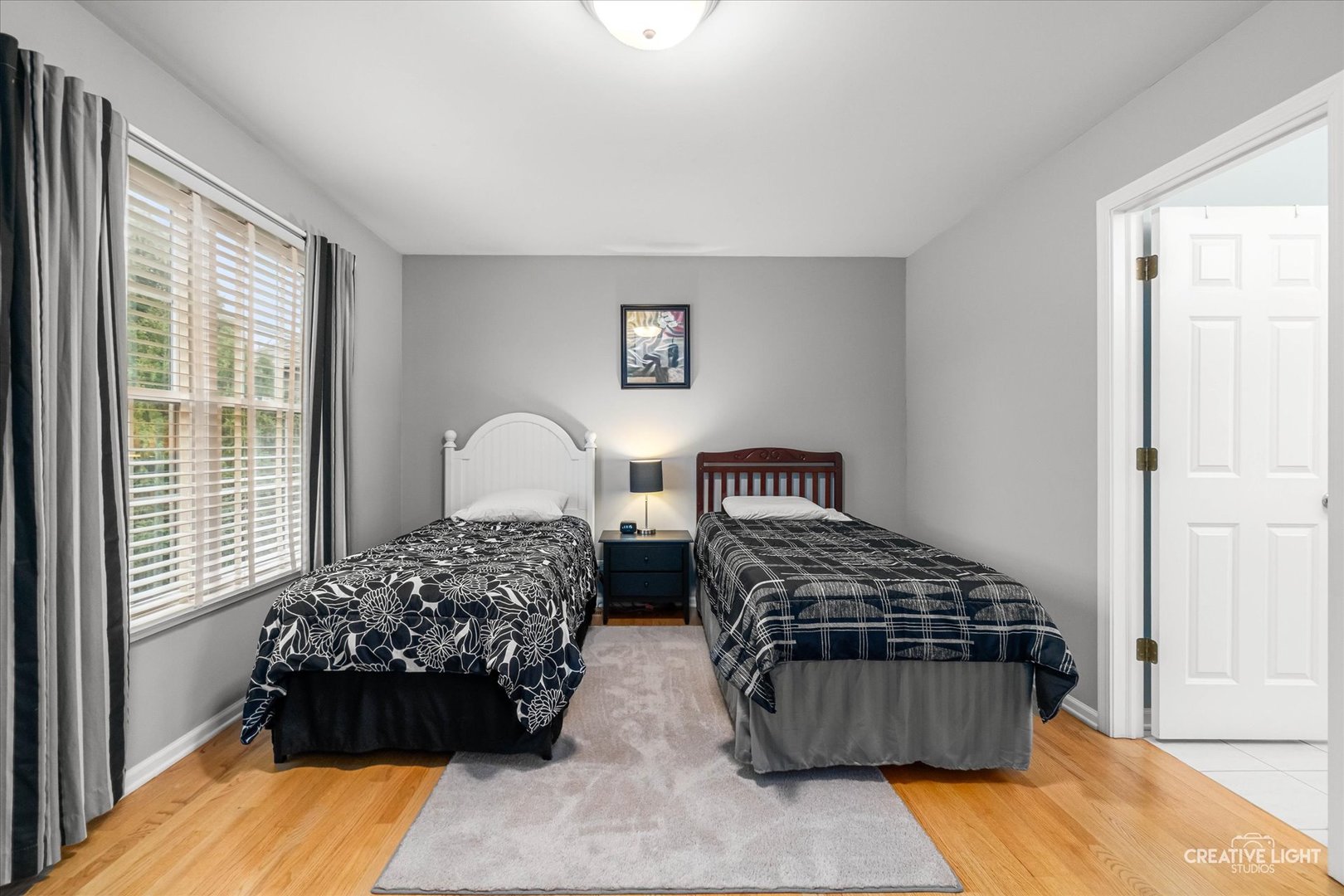 2543 Dewes Lane Naperville, IL 60564 - Photo 31 of 47 a bedroom with a bed and a window