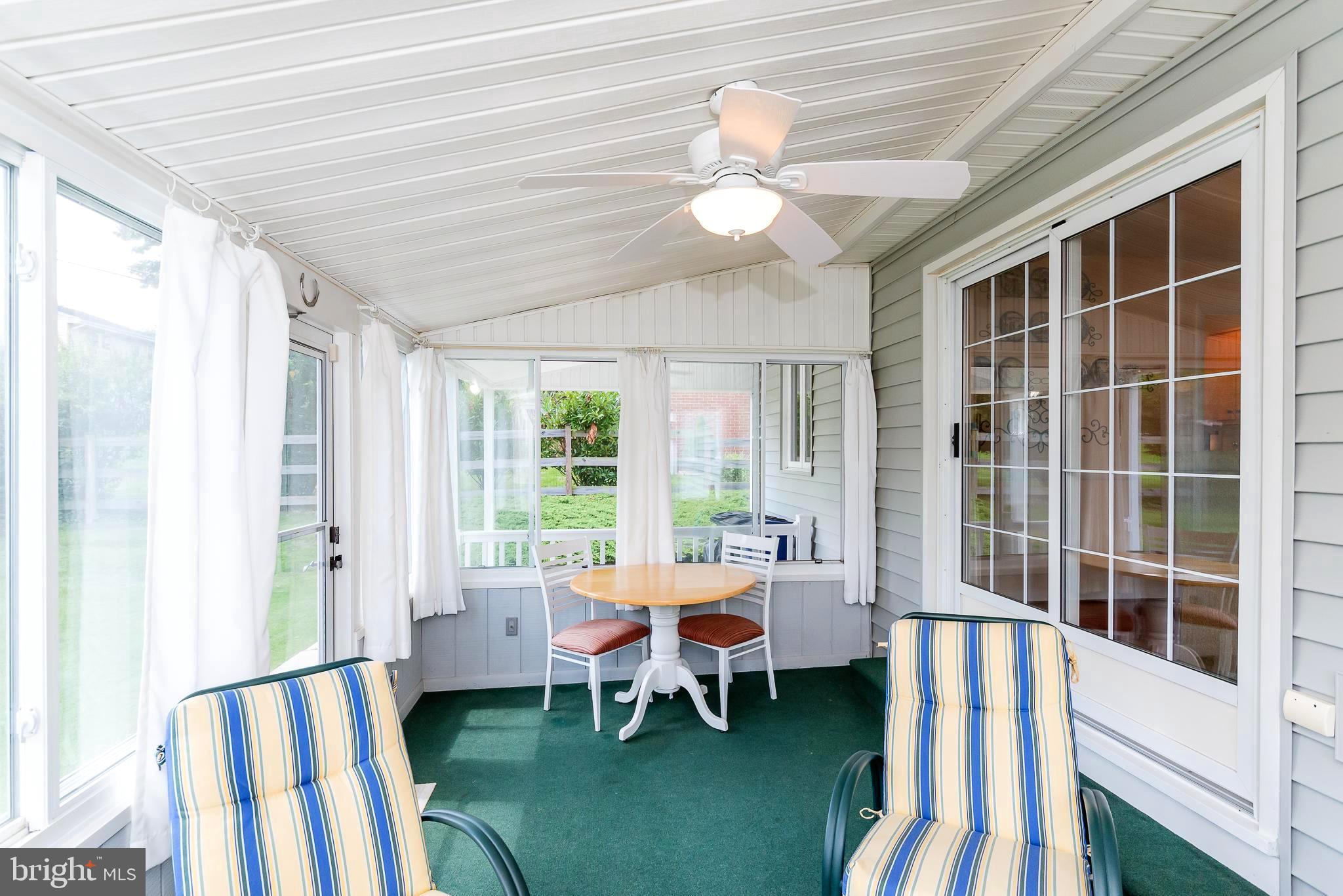 27 Bramleigh Road Lutherville-Timonium, MD 21093 - Photo 16 of 45 SLIDER FROM DINING ROOM TO SUN ROOM