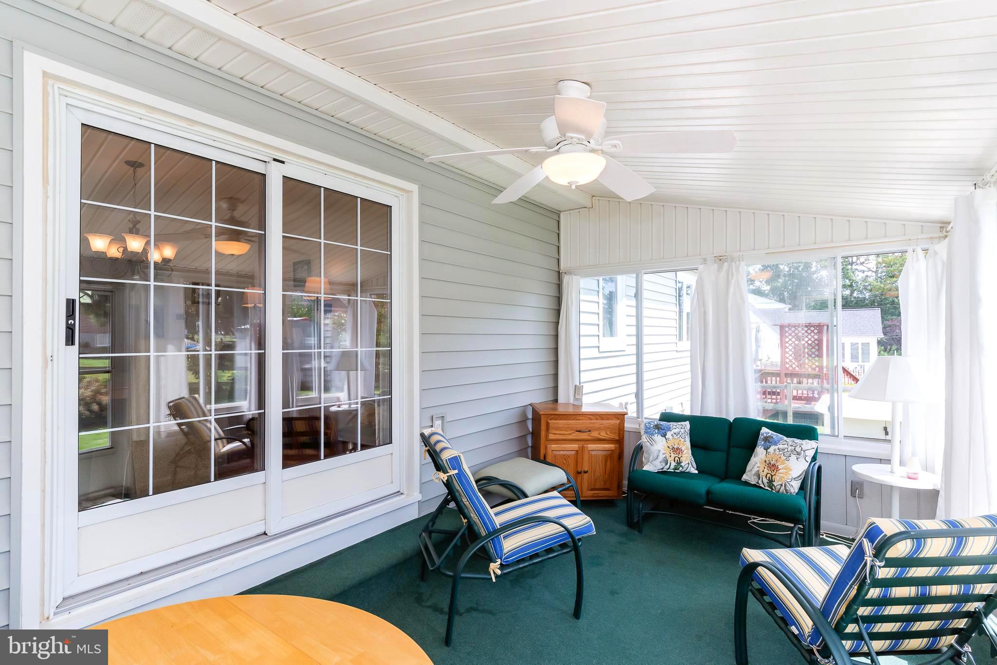 27 Bramleigh Road Lutherville-Timonium, MD 21093 - Photo 17 of 45 CARPET & CEILING FAN IN SUN ROOM