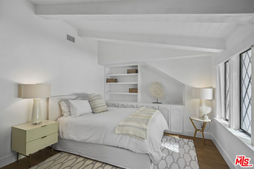 31500 Victoria Point Road Malibu, CA 90265 - Photo 36 of 53 a bedroom with a bed and a couch