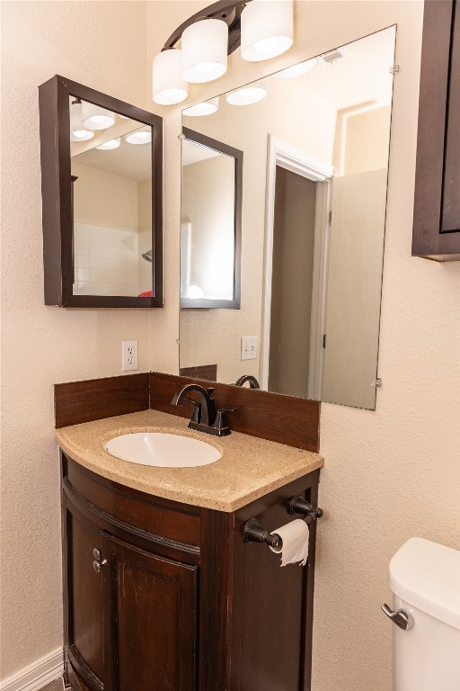 184 Unity Kyle, TX 78640 - Photo 20 of 33 Bathroom with a textured wall and vanity
