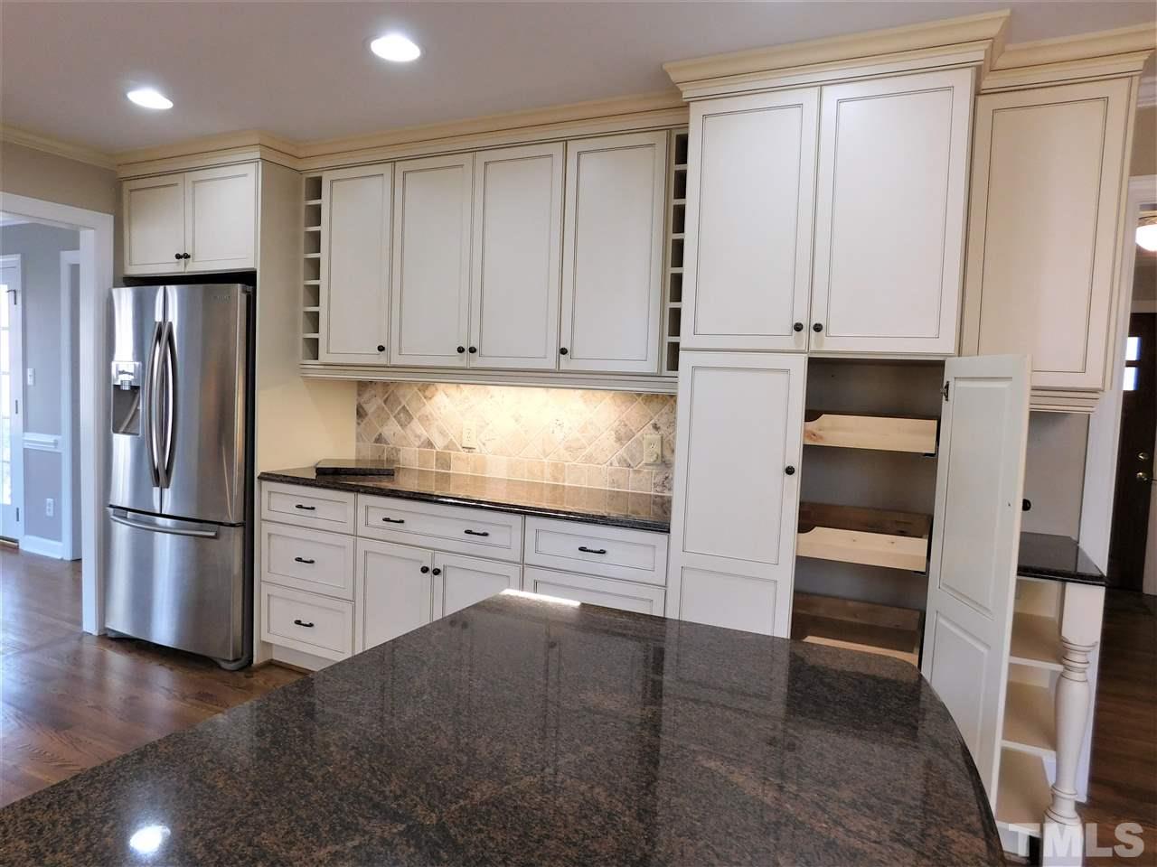 1413 Acres Way Raleigh, NC 27614 - Photo 13 of 30 Custom Built In Wine Racks and Pull Out Pantry Drawers!